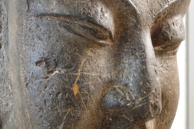 A Chinese carved limestone head of Buddha, Northern Wei (386-535)